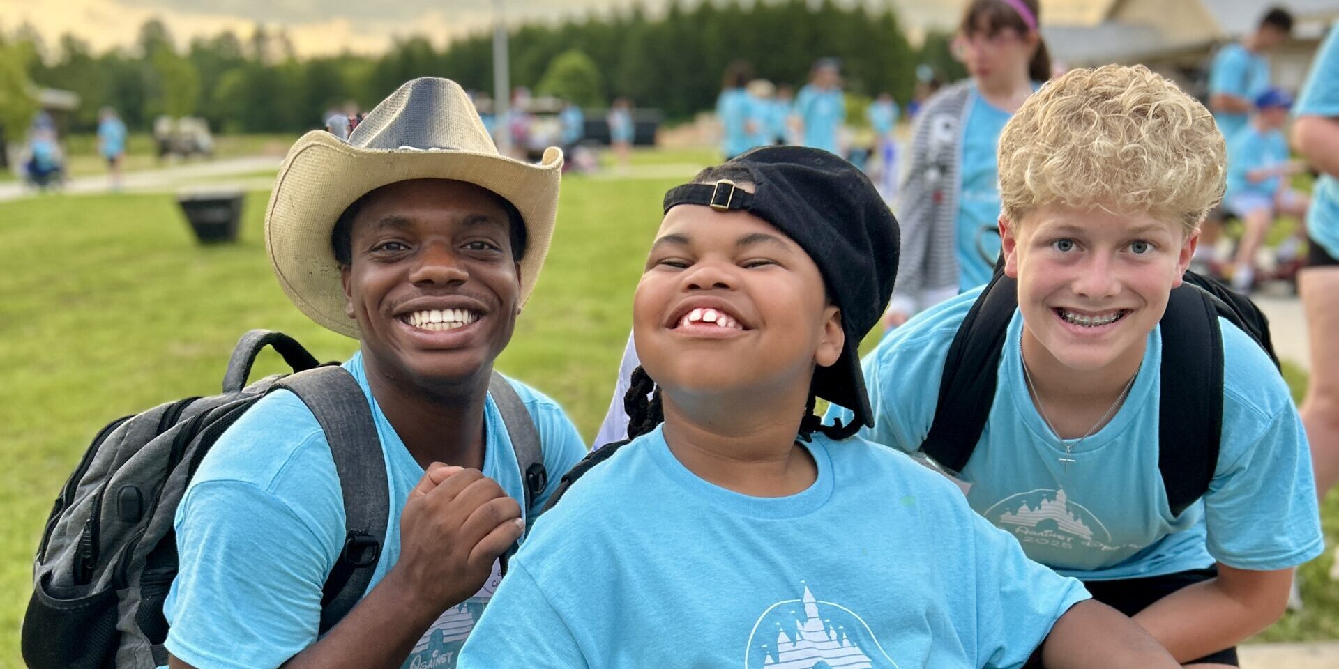 Camper and volunteers at Camp Kamassa