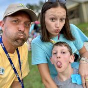 Camper, volunteer, and staff member making funny faces at Camp Kamassa.
