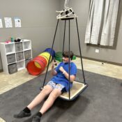 Camper using the sensory room at Camp Kamassa.