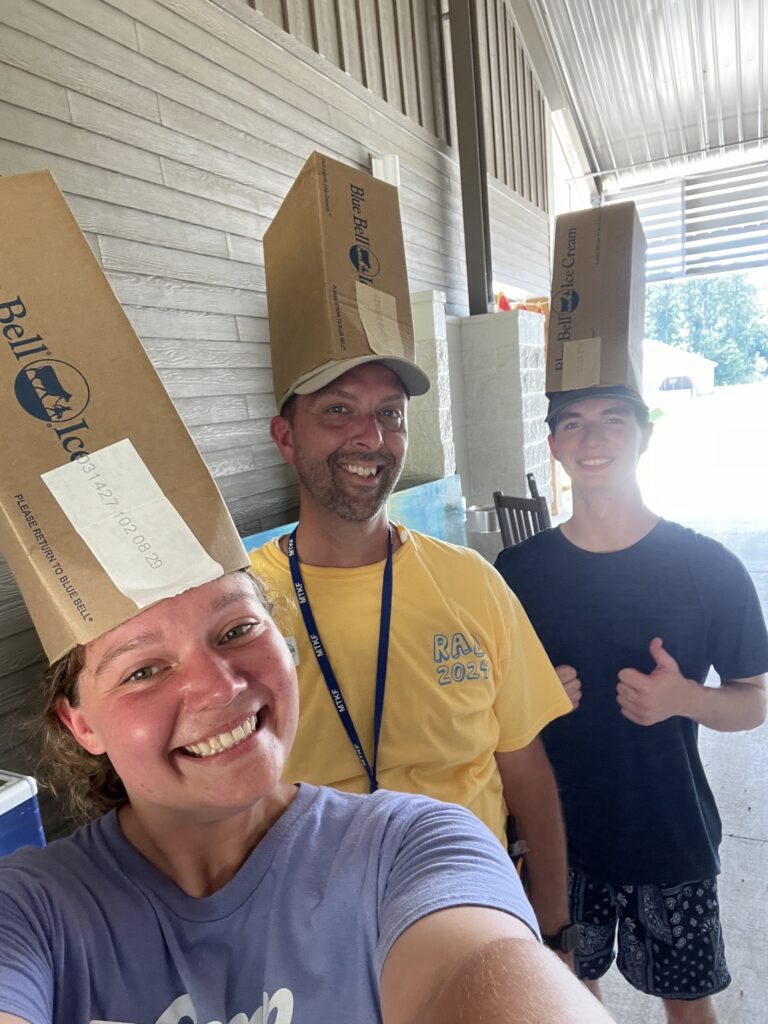 Kamassa summer staff with ice cream boxes on their heads