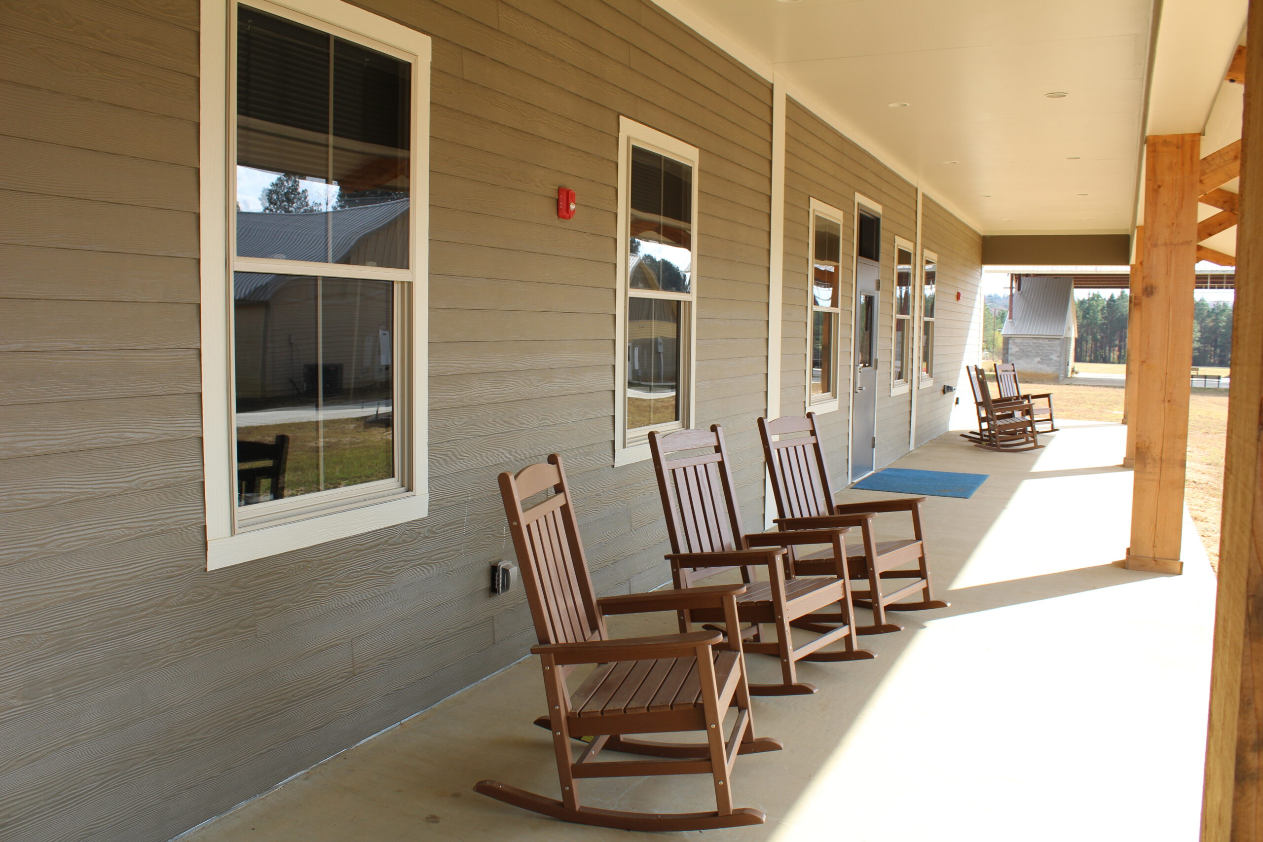 Rocking chairs on porch of Camp Kamassa infirmary