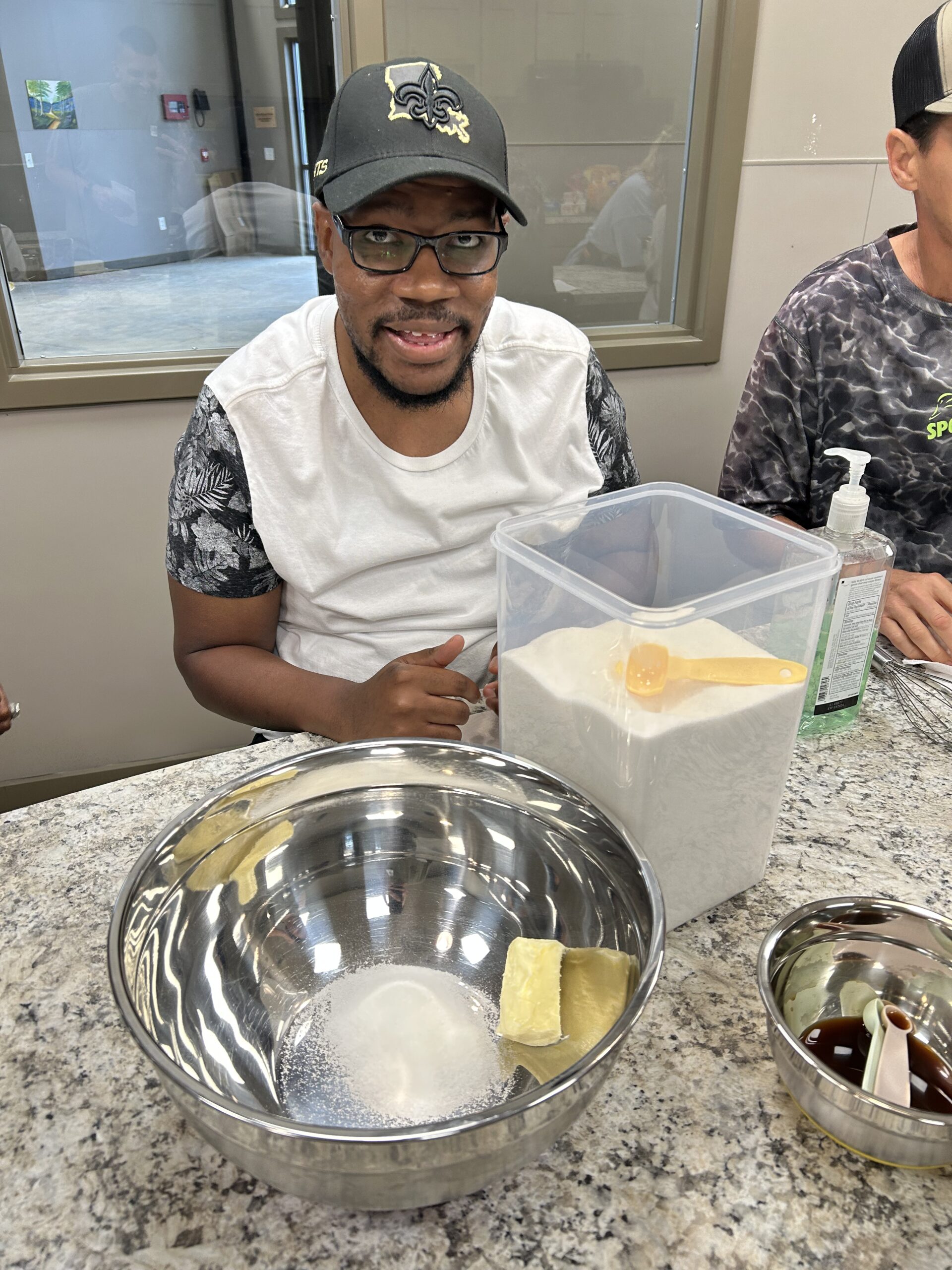 Camper making project in the teaching kitchen at Camp Kamassa.