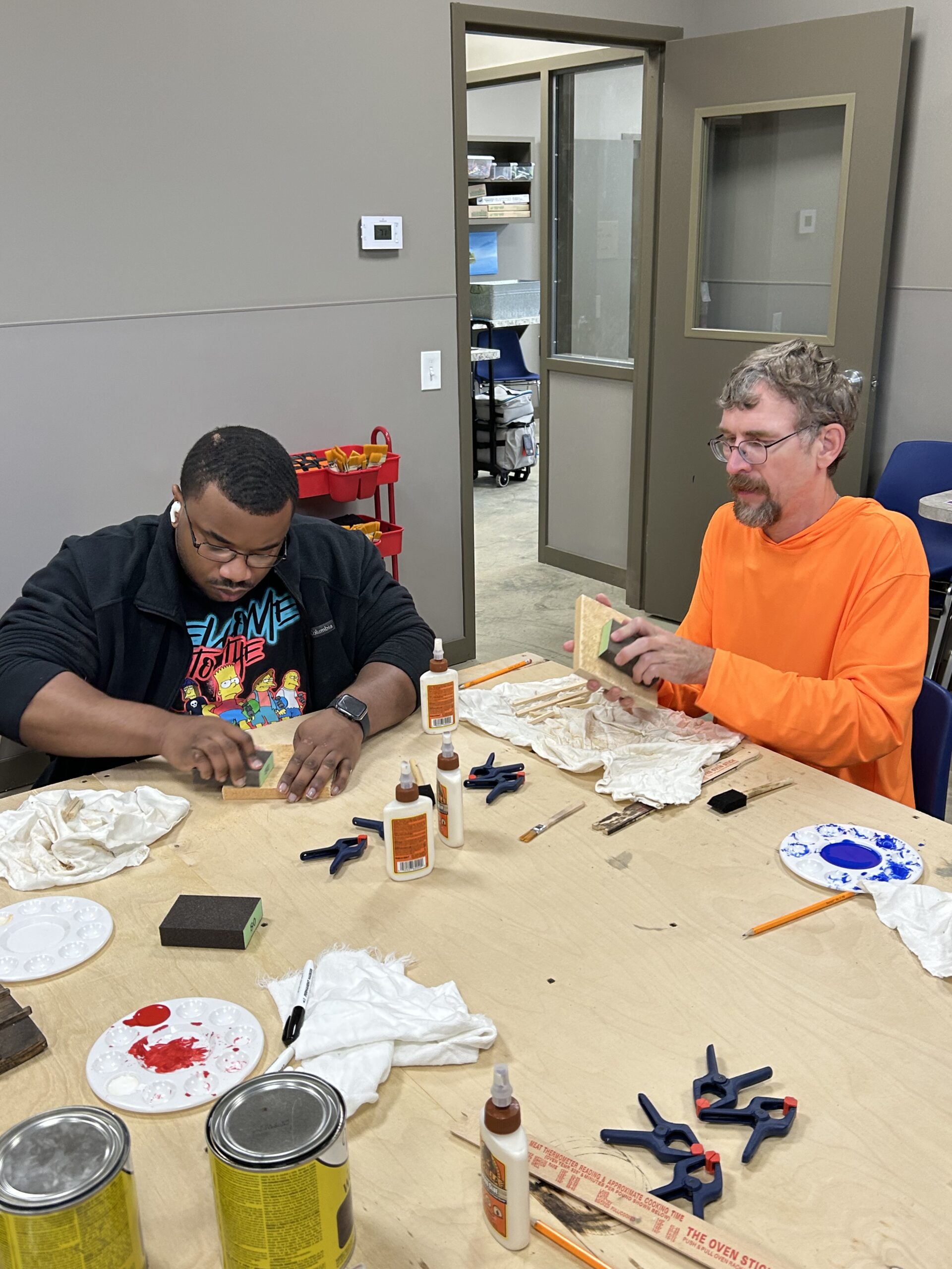 Campers making woodworking project at Camp Kamassa.