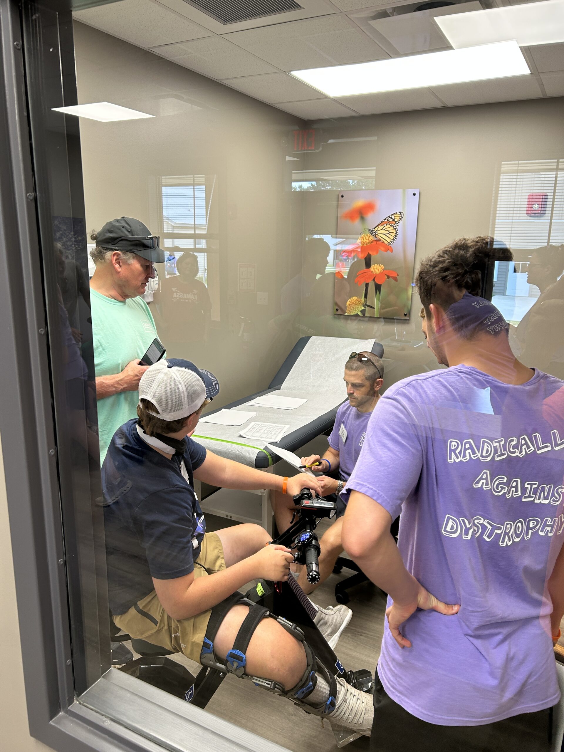 Families having medical check with med staff in Camp Kamassa's infirmary