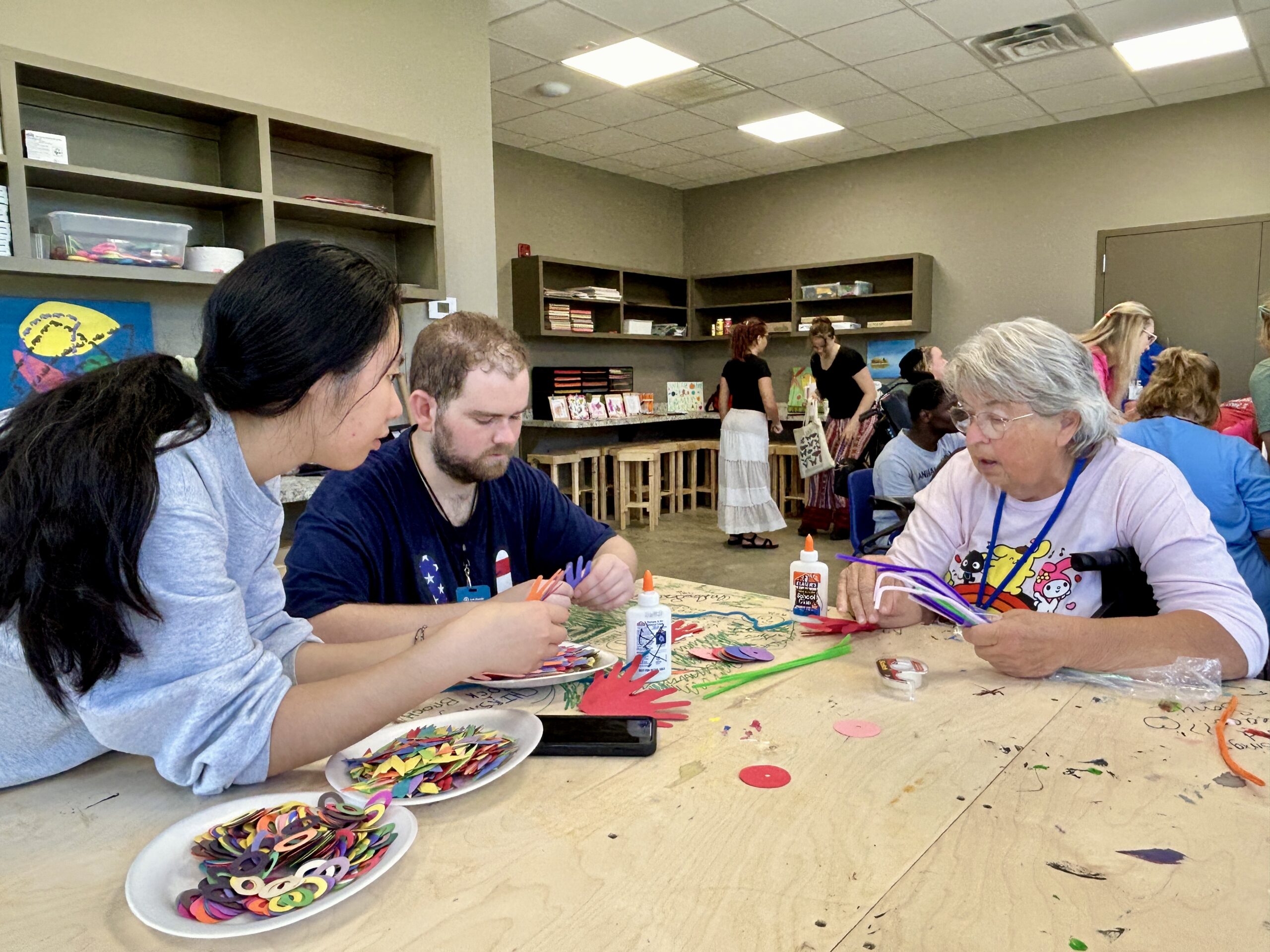 Campers enjoy making crafts in the arts & crafts room at Camp Kamassa.