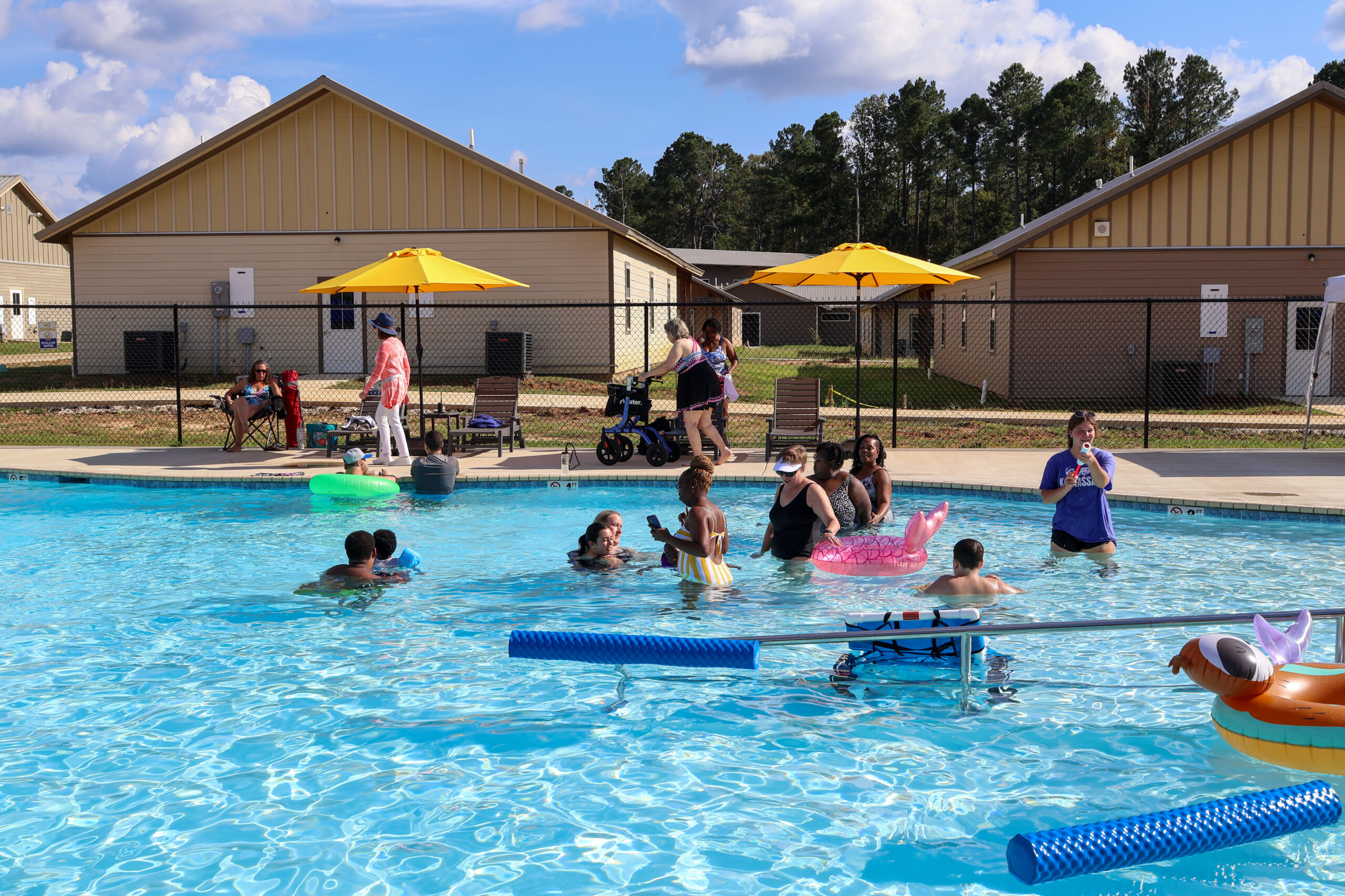 Campers enjoying the pool at Camp Kamassa.